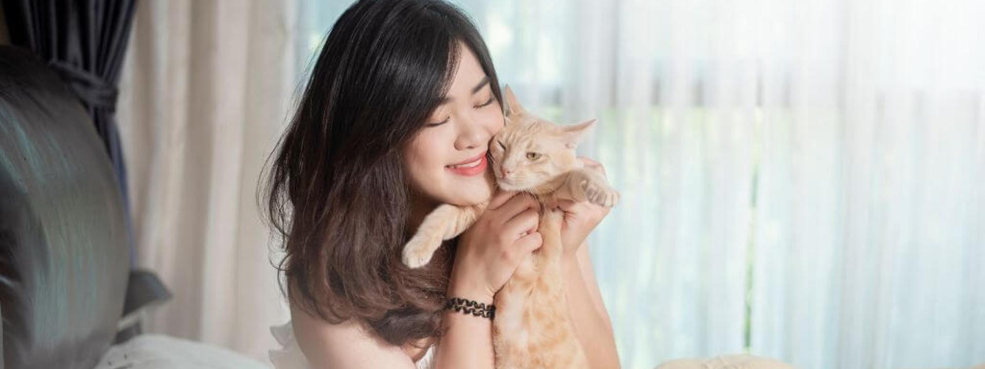 Love Your Pet’s Heart: Tips for Pet Heart Health An owner loving on their cat